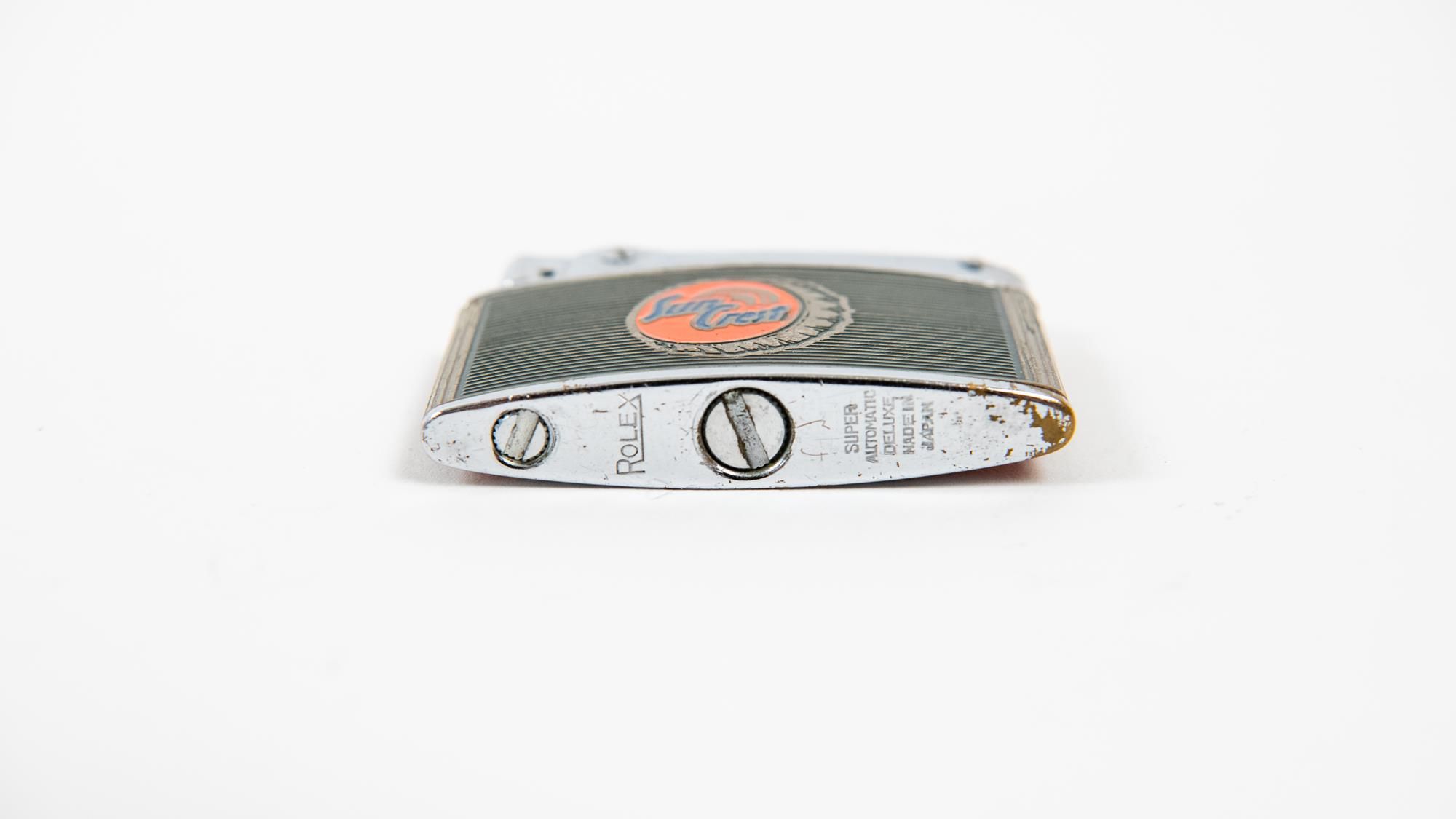 Sun Crest Rolex Advertising Lighter Auction | Mecum On Time