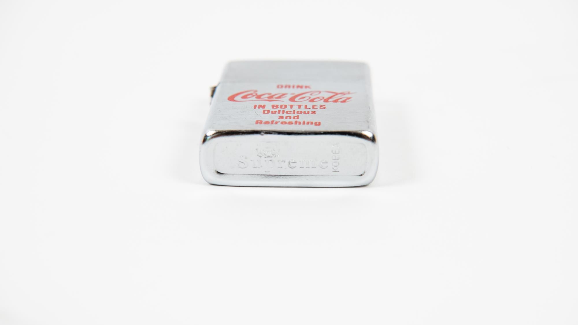 Coca-Cola Penguin & Supreme Advertising Lighters Auction | Mecum 